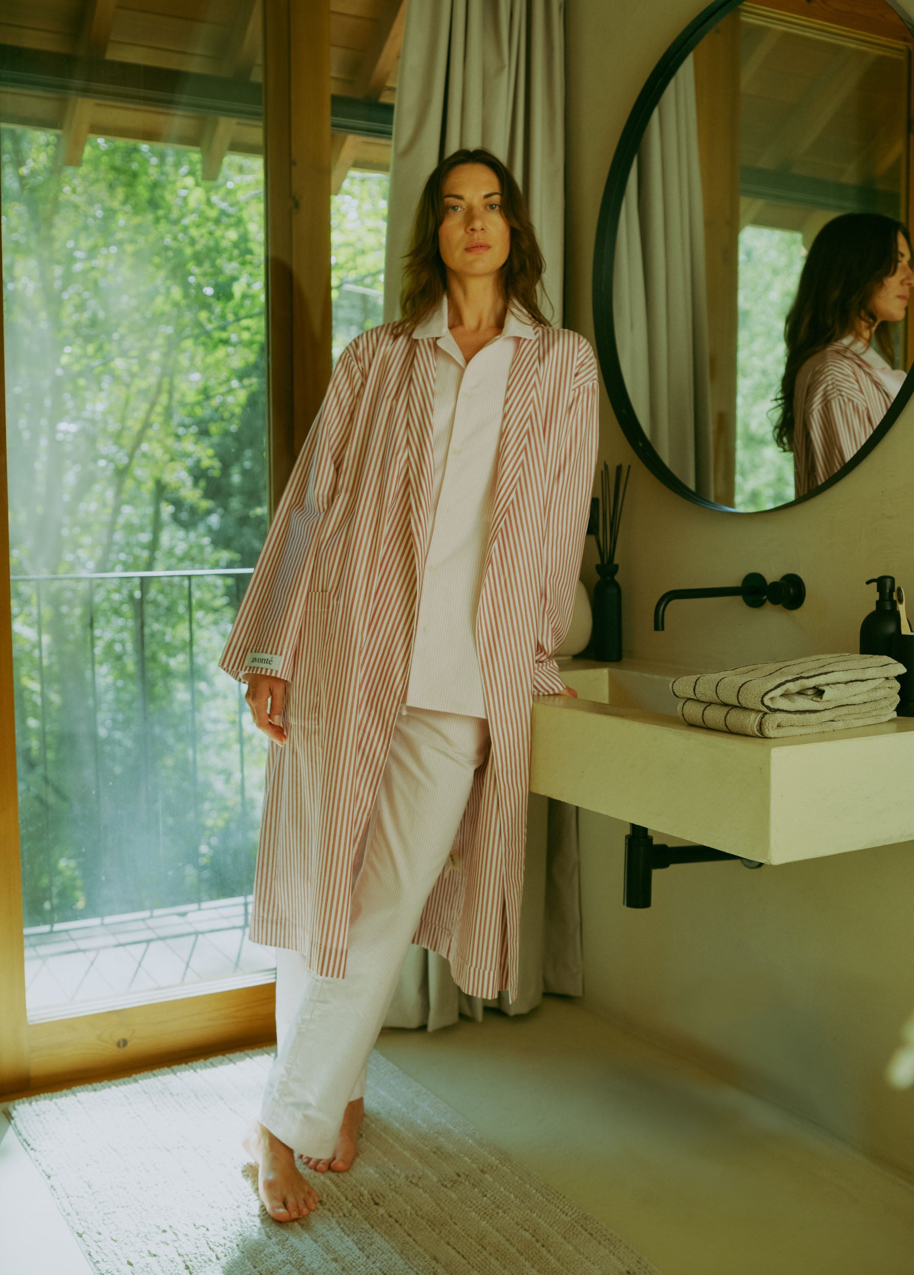 avonte_sustainable sleepwear_robe rusty red stripe_bathroom_@nirenmahajan.jpg